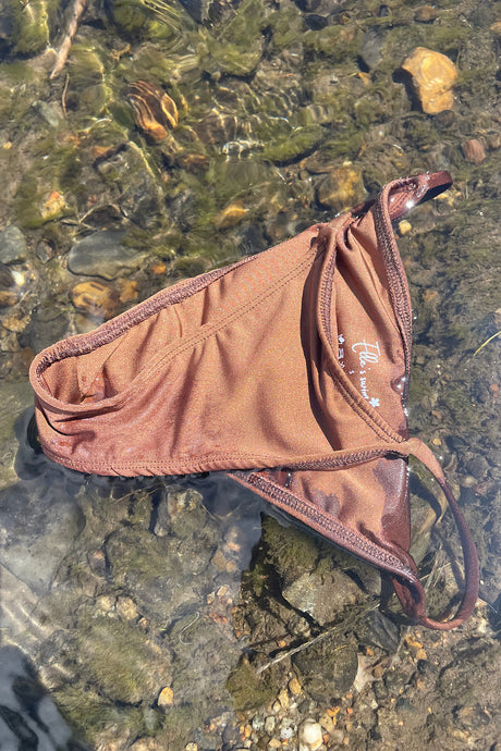Chocolate brown bikini bottoms made with recycled materials.