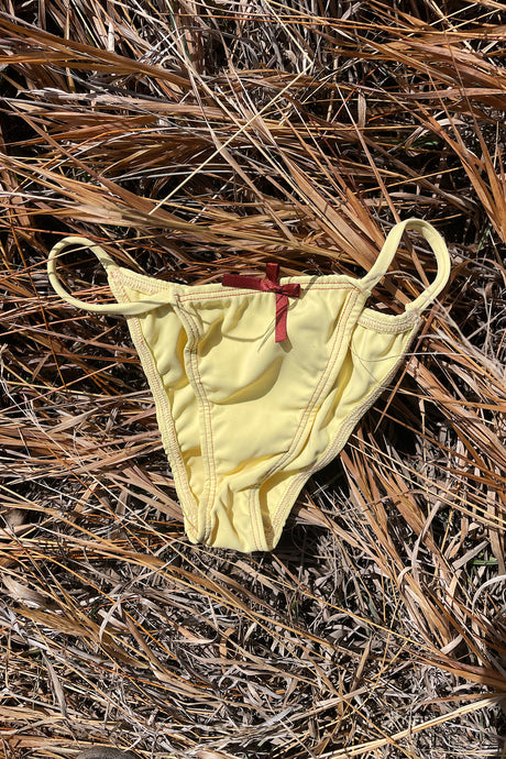 Elle's Swim exclusive baby yellow bikini bottoms.