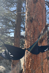 Black balconette bra made from sustainable fibers.