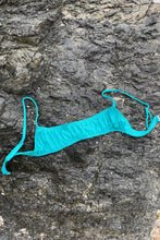 Load image into Gallery viewer, Ribbed green sports bra bikini top by sustainable swimwear company.
