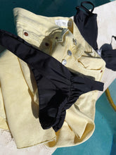 Load image into Gallery viewer, Sustainable black cheeky swim bottoms. 
