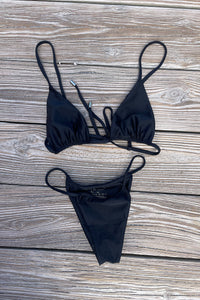 The essential black bikini made with sustainable fabric by elles swim.