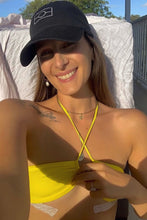 Load image into Gallery viewer, Loni Jane in Elle&#39;s Swim yellow bikini top.
