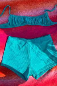 Sustainable swim shorts made by Elle's swim. Ribbed triangl swimwear.